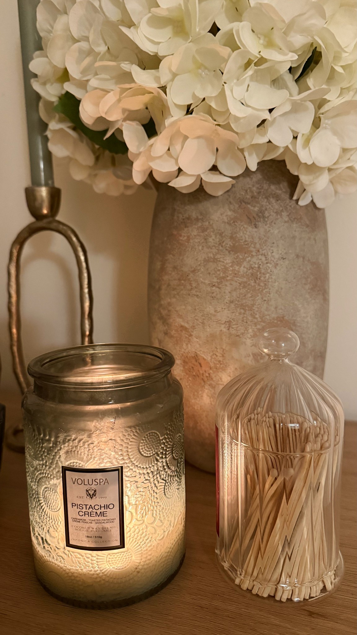 voluspa candle, pistachio creme candle, luxury candle, aesthetic candle, decorative candle jar, embossed glass candle, scented candle, coconut wax candle, clean burning candle, neutral candle decor