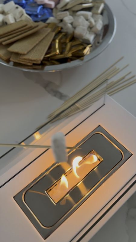 Well this was sure fun! An indoor fire pit that runs on rubbing alcohol for a smokeless flame was the perfect addition to our party. Everyone enjoyed this sleek white tabletop firepit. Using this for s’mores would be such a fun way to celebrate Valentine’s Day or really any day! 

#LTKVideo #LTKGiftGuide #LTKparties