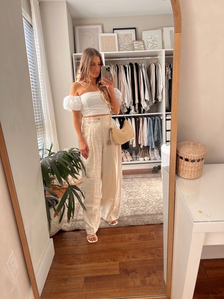 Summer into fall outfit. Linen pants with a cropped white puff sleeve top. It’s somewhere between dressed up and casual depending on how you style it! 

#LTKFind #LTKstyletip