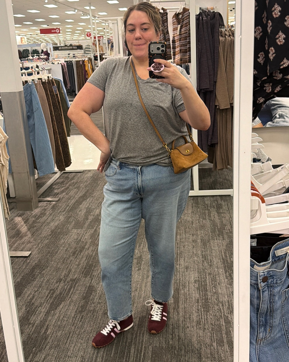 Such a cute longchamp mini bag alternative! This is the faux suede, which I ended up buying because I took the strap out to see if it would fit. Comes in this color, navy blue and a black fake leather. 

But I think I like the nylons even better. So many colors. And I'm 5'10 and size 18/20, and the crossbody is good!
