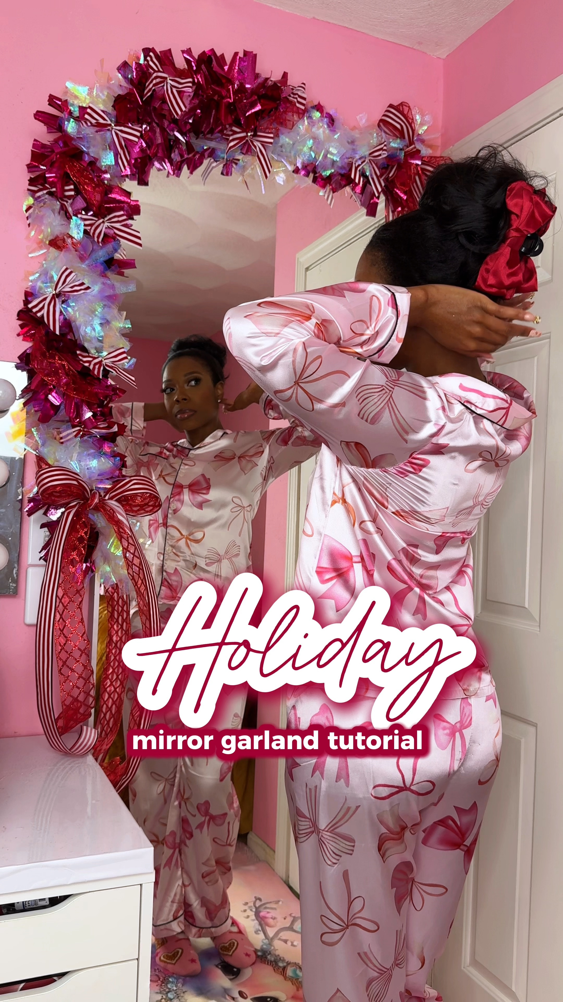 It’s tiiiiiime 🎄💖✨ I love to decorate my full length mirror for Christmas, and this year I got almost everything at Walmart (under $10 each!).

The tinsel garland is a great way to jazz up your Christmas decor 🎄, I can’t believe it was only $10. I wrapped it around my mirror using clear medium command hooks.

I finished off the garland with a pack of mini candy cane print bows ❤️🤍, red glitter ribbon, and candy cane print ribbon.

Also, how cute is my pink baby reindeer rug?! 🙌🏾😍💖 I got it on Temu for like $20. I love how my holiday decor came out this year!

#LTKHome #LTKHoliday #LTKVideo