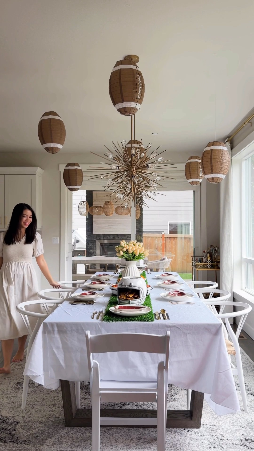 Super Bowl party prep 🏈 Hanging football lanterns, a coloring tablecloth, and DIY football crafts to keep the kids entertained. It’s going to be a fun one! Who are you rooting for? LESGOOOO HAWKS 💙💚 #gamedayready 

helmet chip and dip server, football party supplies, table runner, napkins, tulips, popcorn boxes, cake toppers, Pen holder, football giant coloring banner, mini footballs, football party supplies, tablecloth, pillows

#LTKHome #LTKSeasonal