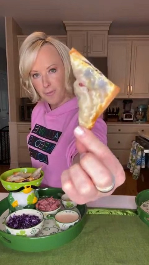 Corned beef and cabbage… but make it crispy! ☘️These Fried Corned Beef & Cabbage Bites take a classic St. Patrick’s Day favorite and make it fun, crunchy, and perfect for snacking. My mom, Gail, shared some tips for putting your own spin on this dish so you can take this appetizer to the next level! I’ve also linked my outfit details so you can shop my look!


Total Time: 25 mins
Prep Time: 20 mins
Cook Time: 5 mins
Yield: 6 servings

INGREDIENTS
    •    2 cups cooked cabbage, coarsely chopped
    •    1 cup (packed) cooked corned beef, coarsely chopped
    •    Salt and pepper, to taste
    •    6 wonton wrappers
    •    1 egg

DIRECTIONS
    1    Place cabbage and corned beef in food processor, and season with salt and pepper to taste. Pulse until pieces are pea-sized.
    2    In a small bowl mix egg and 2 tablespoons water until well combined
    3    Working one at a time, place wonton wrapper down on work surface with one corner facing you. Place about ⅓ cup of filling into center of wrapper and form a 4” horizontal log. Using a pastry brush, apply a light coat of egg mixture to all sides of wonton wrapper. Tuck the wrapper from corner to corner, while pinching around the edges to enclose the filling.
    4    Preheat oil to 350°F or preheat air fryer to 350°F. Working in 2 batches, fry wontons until lightly browned and crispy, about 3-5 minutes. If using air fryer, bake for 12 minutes and flip midway through to allow both sides to get  crispy. Serve on a temp-tations® tray with your favorite sauces!