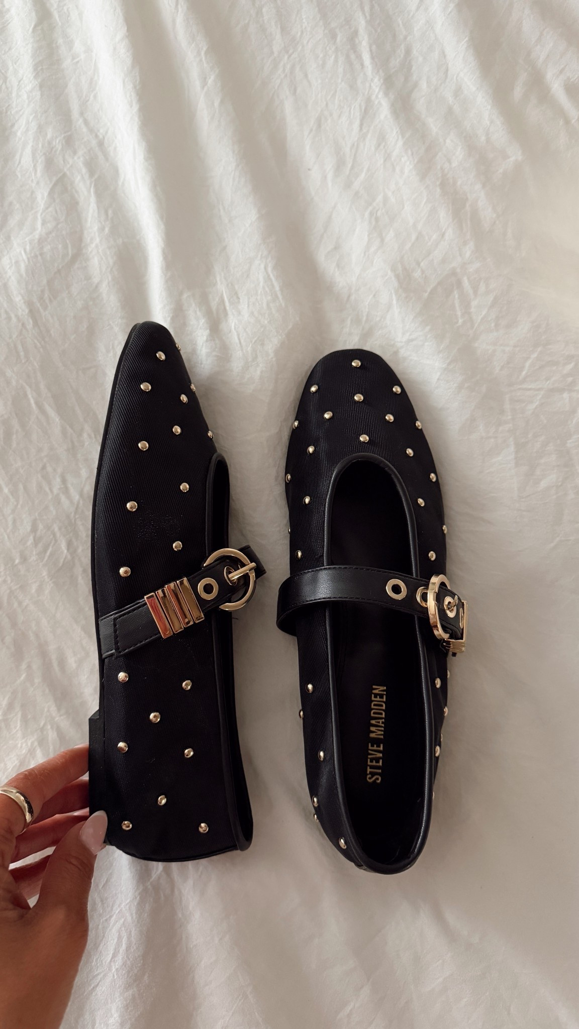 black + gold stuffed ballet flats! these are so cute, i love the tiny studs + gold buckle detail. linking some styles similar to these. fit tts. steve madden #ltkshoecrush