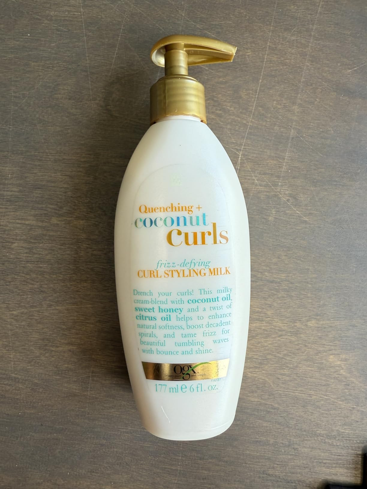 OGX Quenching + Coconut Curls Frizz-Defying Styling Milk, Paraben-Free and Sulfated-Surfactants Free Nourishing Leave-In Hair Treatment with Coconut, Citrus Oil & Honey, 6 fl oz | Amazon (US)