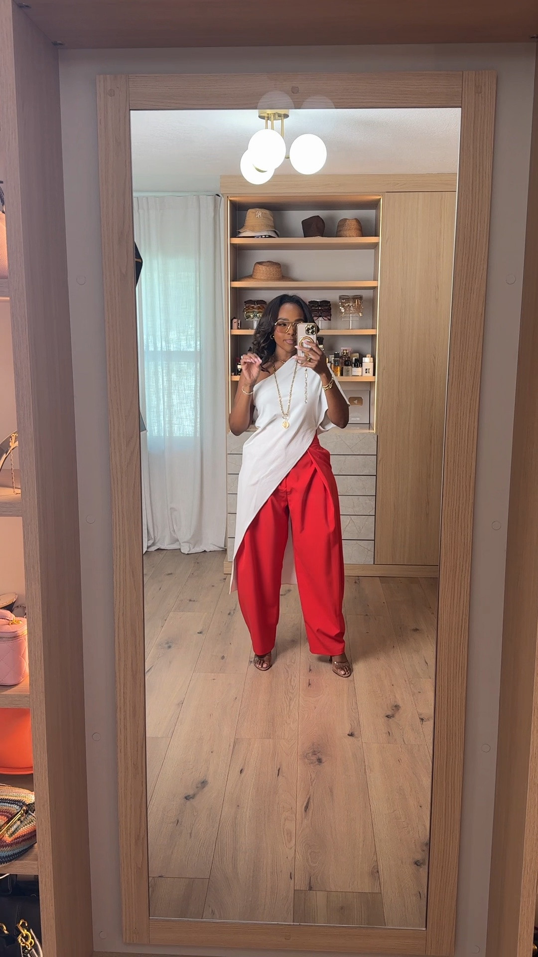 Hi Babes! ❤️🤍

Can we talk about these red pants for a second?! 😍

I know bold colors can feel intimidating, but pairing them with a simple white top makes the whole look feel so chic and effortless. It's the perfect outfit when you want to stand out without trying too hard.

Fit Details:
• Asymmetrical white tunic top
• High-waisted red statement pants
• Neutral heels
• Long gold layered necklace
• Minimal accessories

Where to wear:
• Brunch with the girls
• Vacation dinners
• Art shows
• Date nights
• Birthday celebrations
• Any day you want to make a statement

Everything is linked below!

xx, Kira | IG: KirasFashionFinds

Measurements: 5'3" | Wearing Size XS

@Zara