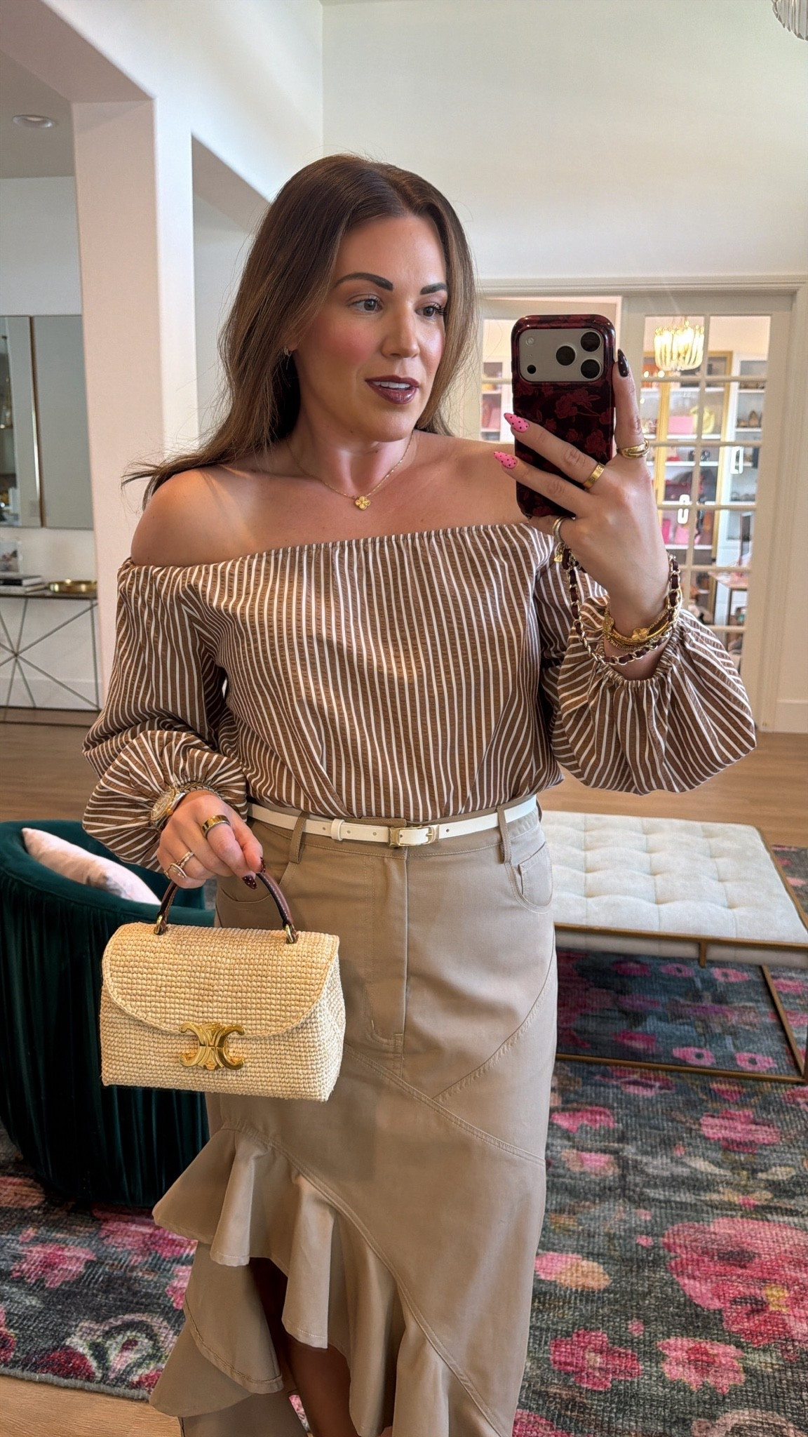 curvy midsize transitional fall look! wearing size medium in brown striped off the shoulder top and medium in ruffle khaki skirt 🤎

#LTKSeasonal #LTKMidsize