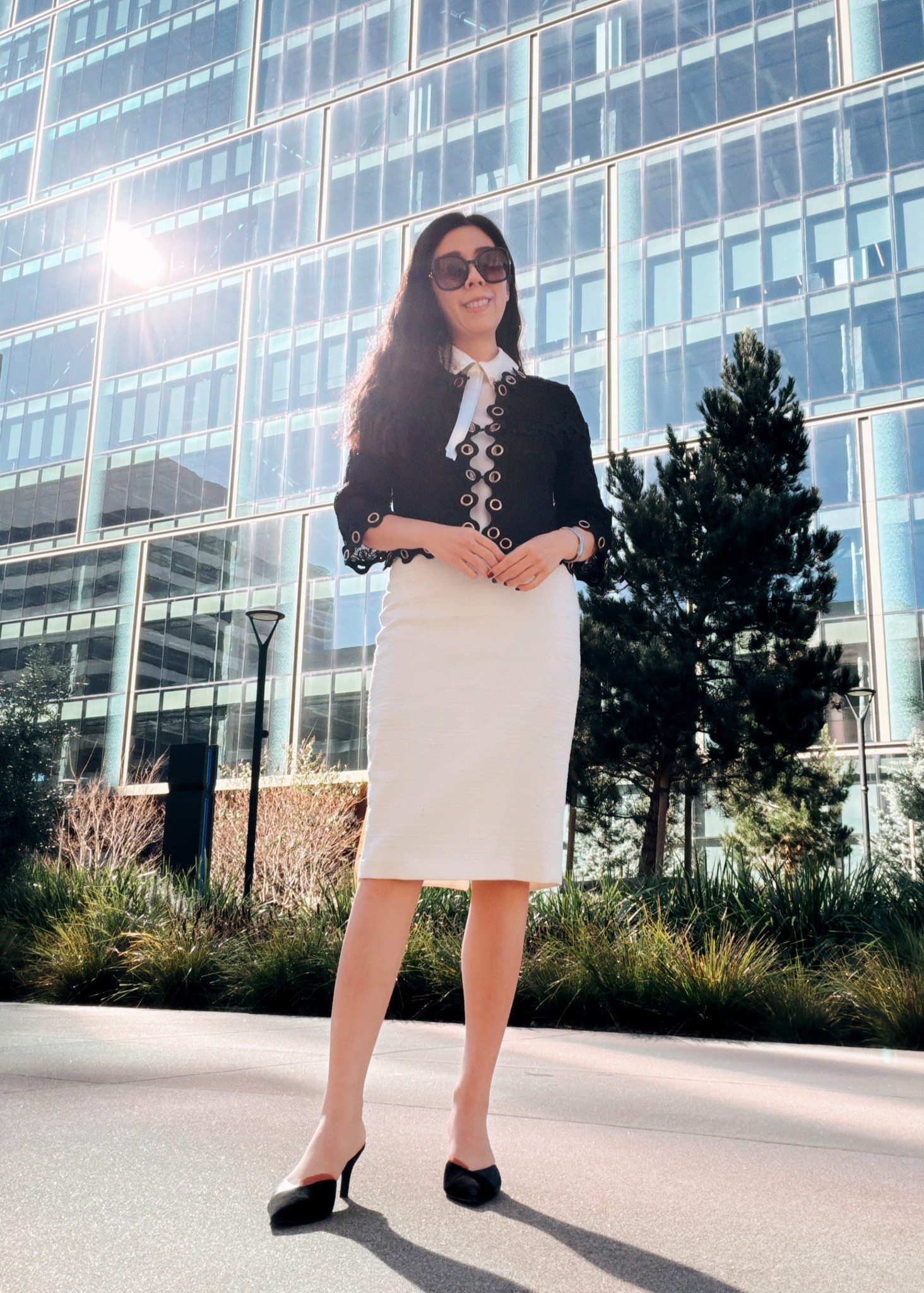 A classic black and white look for a day at the office. I started with an ivory base, sleeveless collar top with a high waisted pencil skirt, and added some black statement pieces. I always get so many compliments every time I wear this cropped lace jacket and these suede and leather kitten heel mules allow me to run around to meetings and work dinners without any pain! #corporatestyle #classyoutfit #oldmoney #blackandwhite #businesscasual #9to5style 

#LTKPetite #LTKootd #LTKWorkwear