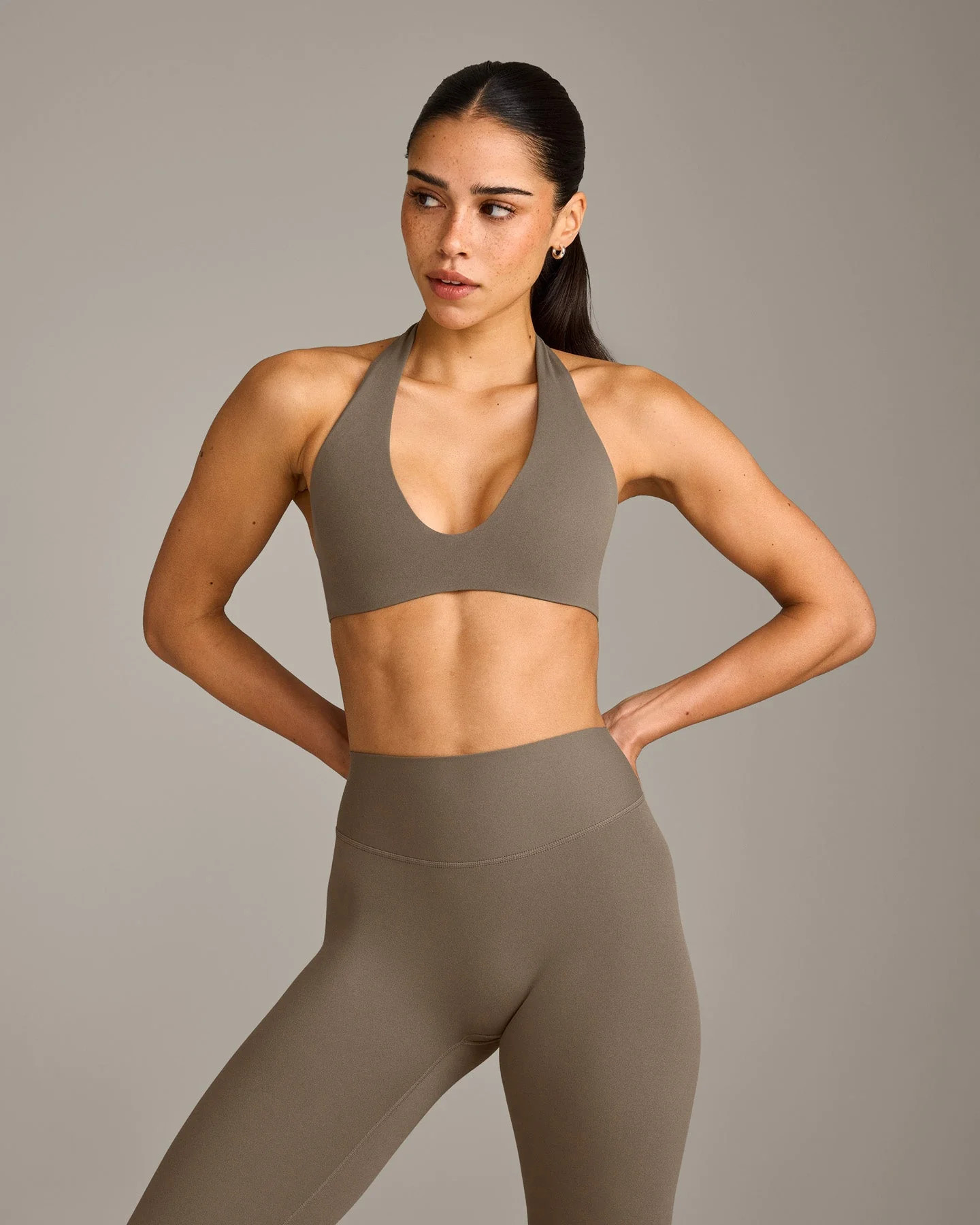 SoftMotion™ Minimal Halter Neck Bralette with Gray Logo 
 Moss Brown | Oner Active (UK / US)