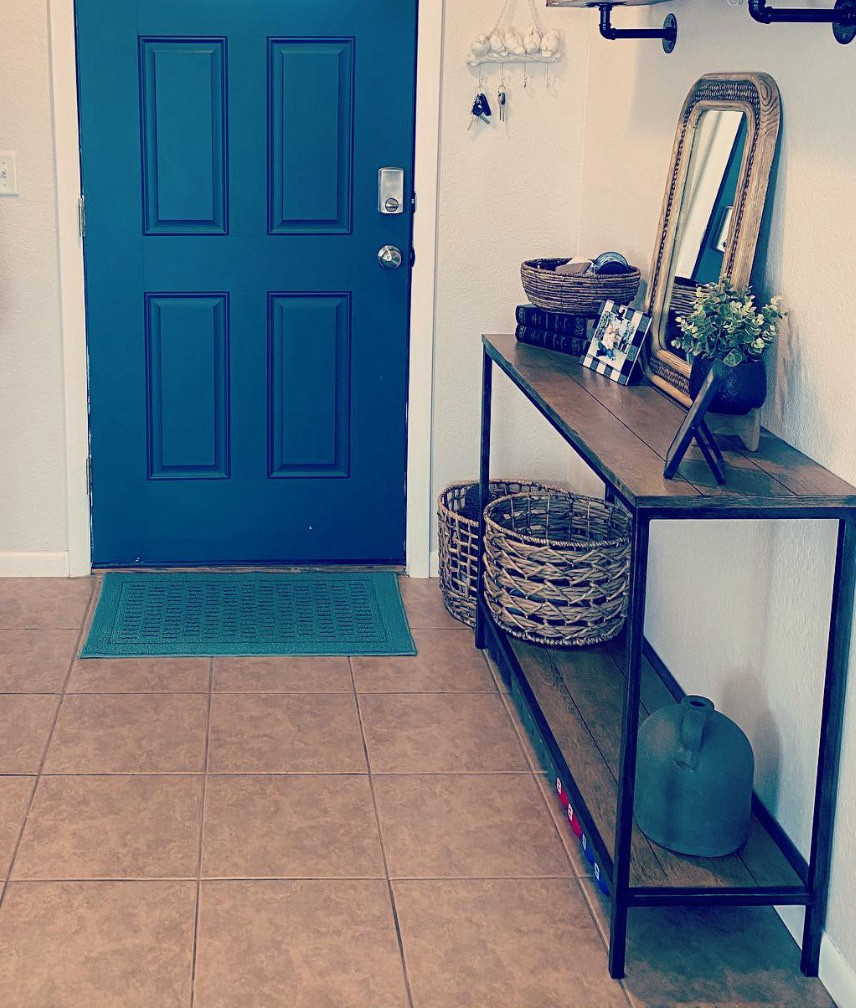 Modern Entryway Table Styling | Narrow Console + Basket Storage

One of my favorite functional pieces in our home. This slim entryway table gives us the perfect drop zone for keys, mail, and decor without taking up a ton of space.

The baskets underneath are doing the real work though… hiding shoes, sports gear, and all the random things that magically appear by the front door. 🙃

I love the warm wood + black metal combo because it works with almost any style and makes the entryway feel finished the second you walk in.

Linking my console table plus similar options and the decor pieces I used to style it.


#LTKSaleAlert #LTKU #LTKHome