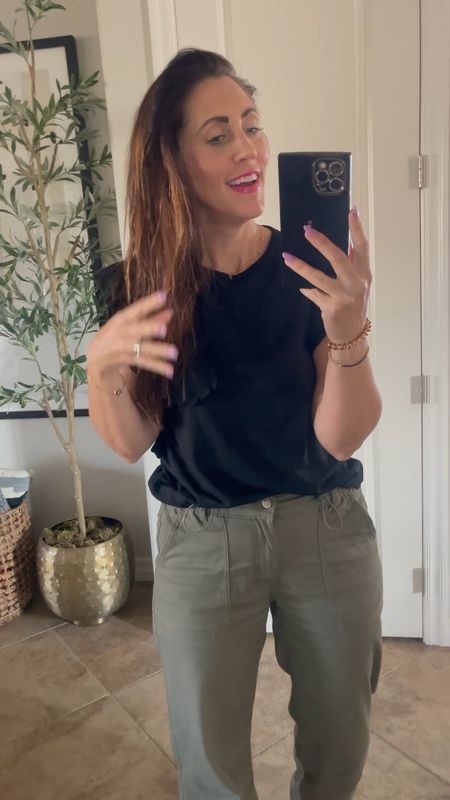 Easy casual outfit with these green cargo/parachute pants (wearing size small) and black ruffled pocket tee! Wearing size small 🖤 

Pants are only $18!! I have the light pink pair too! 

#LTKstyletip #LTKsalealert #LTKfindsunder50