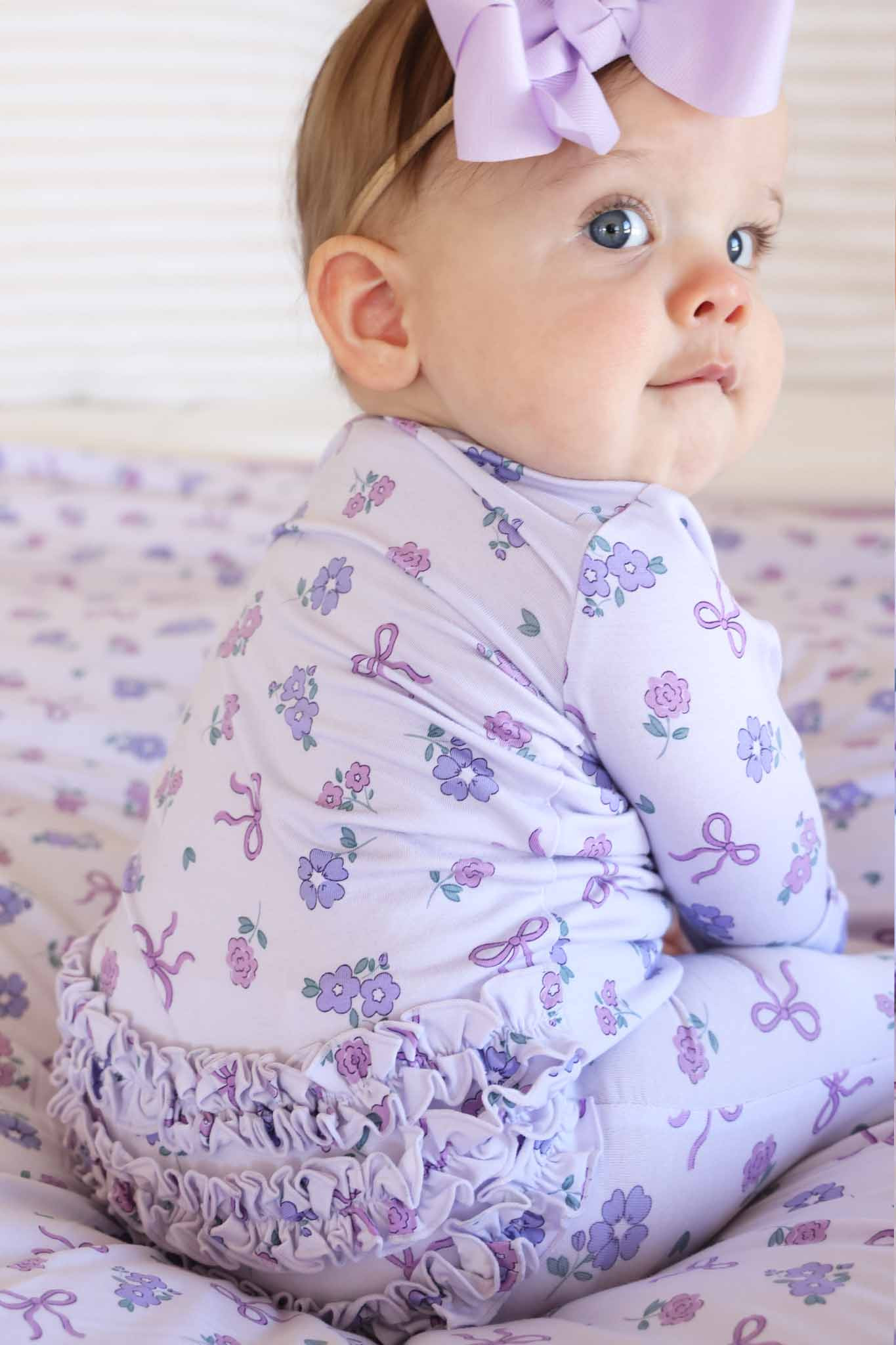 Ribbon & Roses Ruffle Zipper Footie | Purple | Caden Lane