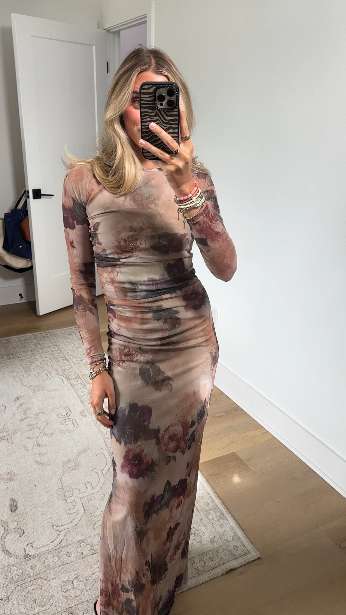 Baltic Born code SLOANE15. Wearing size xs. Make a striking entrance in the Isadora Maxi Dress, a mesh bodycon gown designed to flatter curves while remaining comfortable. The dark taupe floral print and sheer long sleeves create an elegant, romantic silhouette perfect for evening events and special occasions.

#LTKootd #LTKWedding #LTKSaleAlert