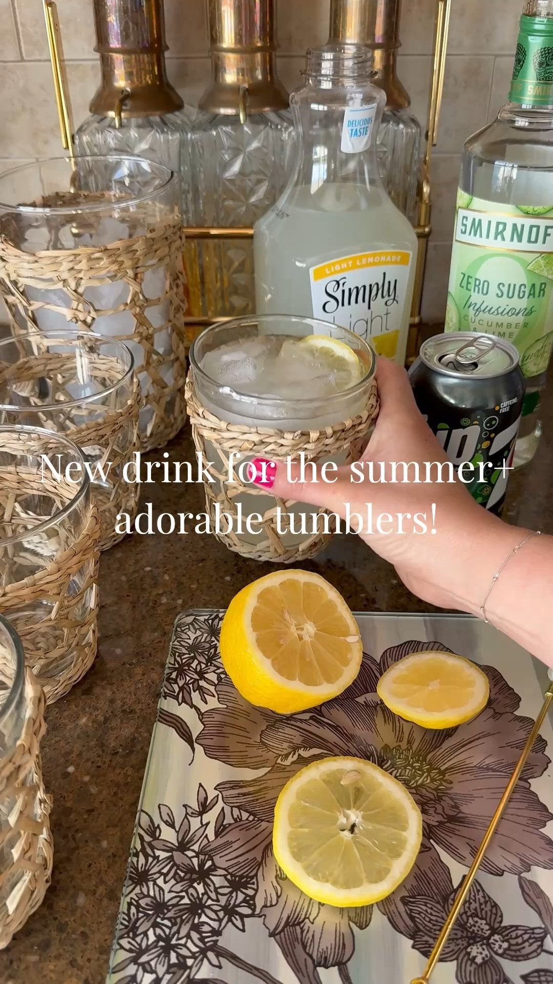 Refreshing drink for summer 🥒🍋✨
— 2oz cucumber vodka
— 4 oz light lemonade 
— top with 7Up Zero
— serve over ice with lemon or cucumber slices and everything tastes better out of a cute vessel like these wicker tumblers from @Target!
