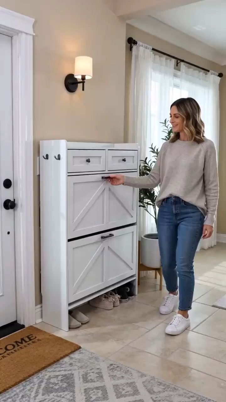 Tired of entryway clutter?
Say hello
to smart organization with this stylish Farmhouse Shoe Cabinet! It's designed narrow to fit perfectly, featuring 2 flip drawers for your shoes and convenient top drawers for keys or essentials. Plus, adjustable shelves and handy hooks keep everything tidy. Transform your hallway or foyer from mess to organized chic.
• Tap to shop this freestanding storage solution and reclaim your space! #shoecabinet #entrywayorganizer
#dealsforyoursdays

#LTKHome #LTKSaleAlert