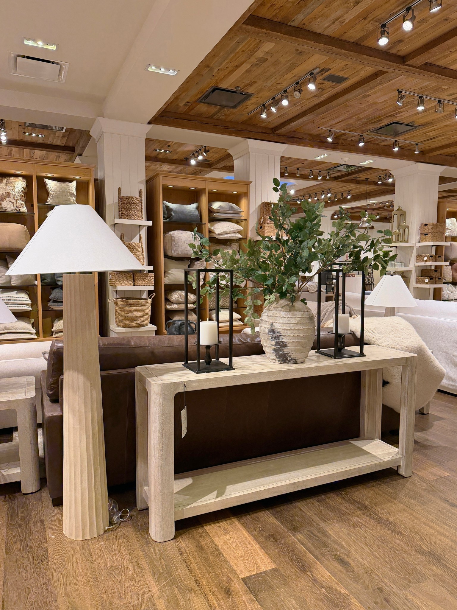 Console moment! 🤎🌿 Neutral, earthy, and effortlessly put together. The bestselling Aptos Console Table from Pottery Barn pairs so beautifully with the new Harbor Rattan Floor Lamp for that warm, organic feel. ☺️ Styled simply with an oversized vase and faux eucalyptus branches, this setup lets the natural wood tones and woven textures shine. A calm, grounded look that feels collected without being overdone. Linked the full console inspo to shop! ✨ #PotteryBarn #ConsoleTable #EntrywayInspo

#LTKSaleAlert #LTKHome #LTKSpringSale