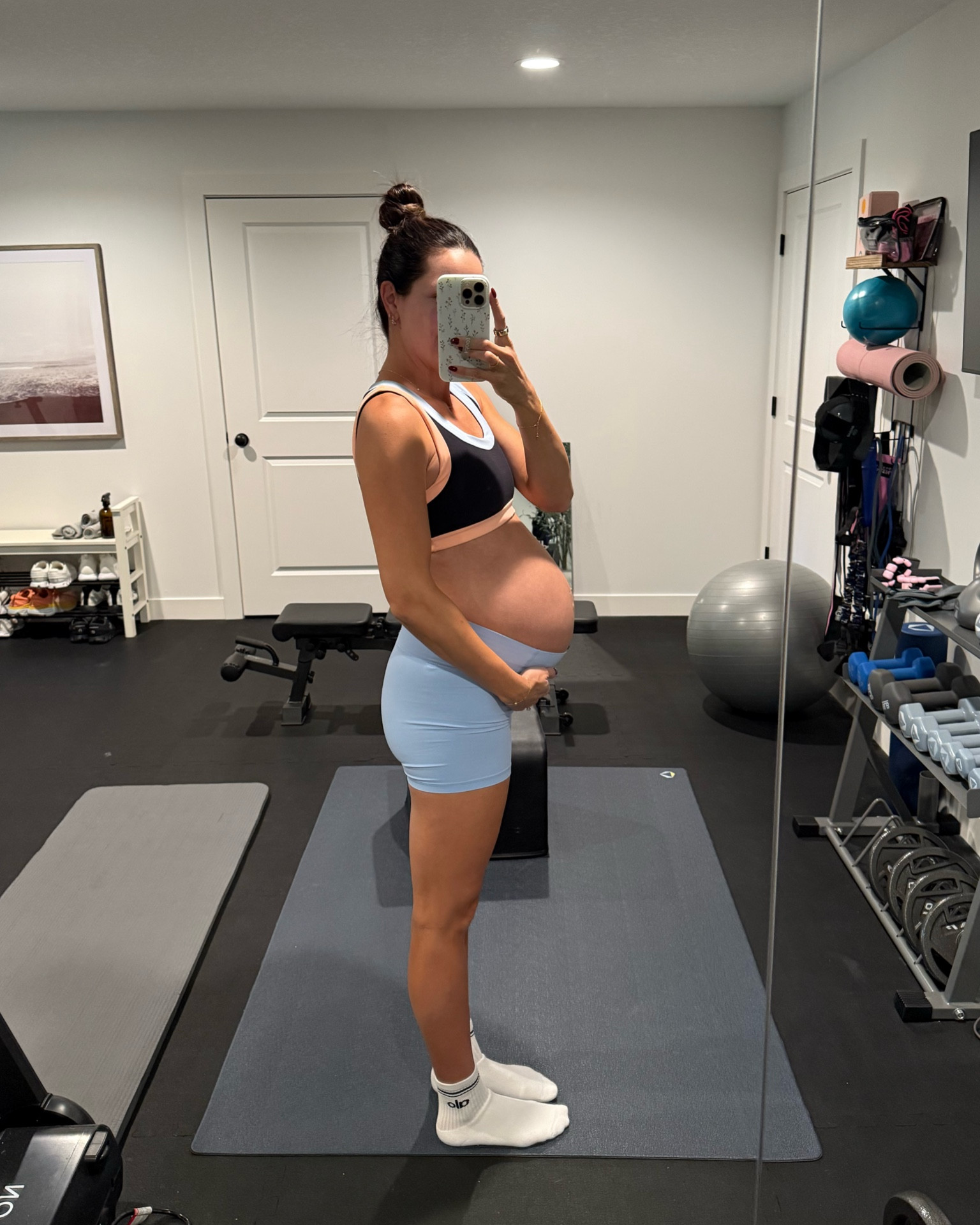 Love this FP movement workout set 🧡🩵 I’ve been able to wear it pre-pregnancy and during since the material is really soft and stretchy. 

--Wearing a M in the bra and S in the biker shorts. 

#LTKActive #LTKBump #LTKFitness