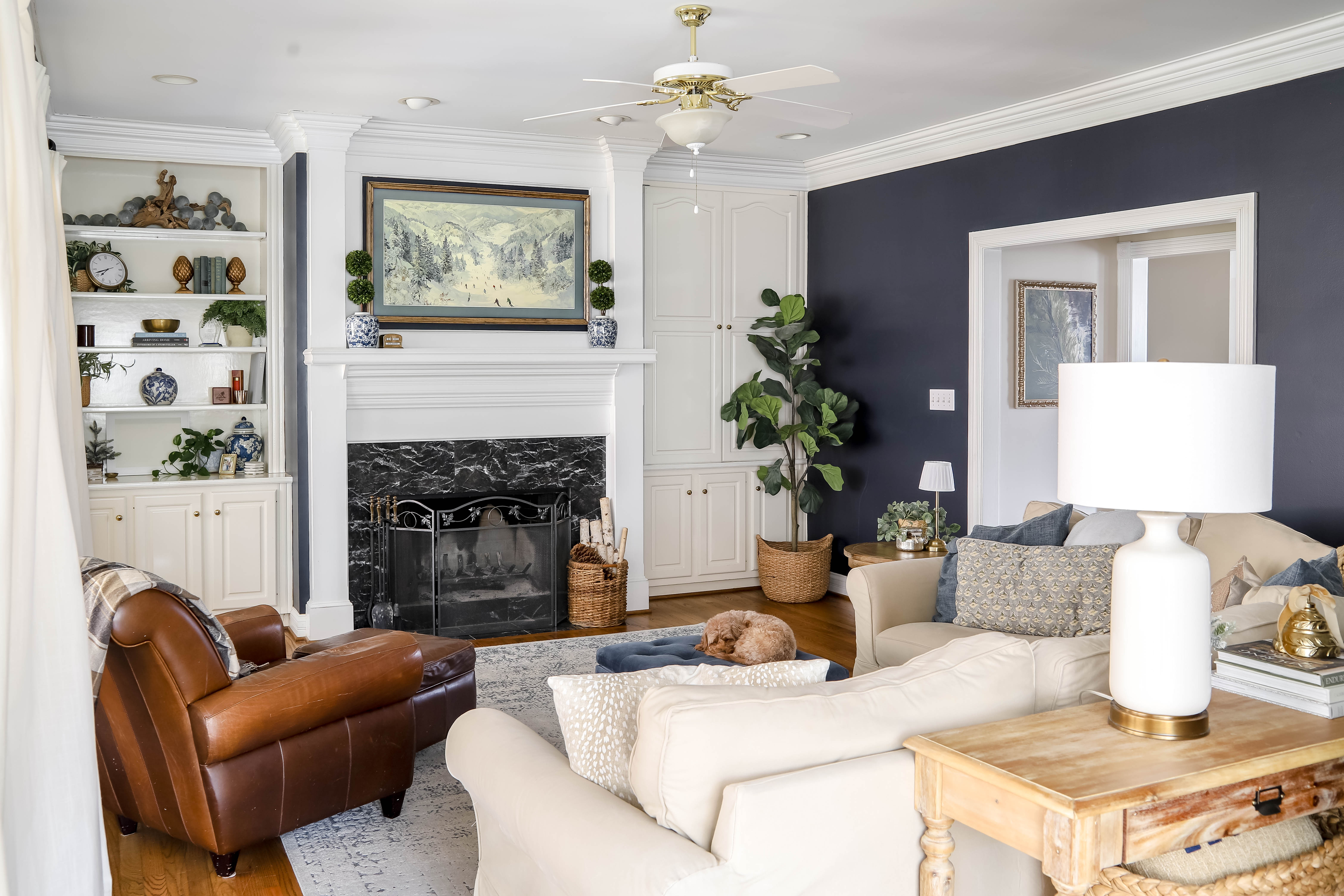 Our living room is cozy hangout central during the long winter months! Our wall of windows keeps things bright while our fireplace keeps us warm.  

 #LTKSeasonal #LTKHome