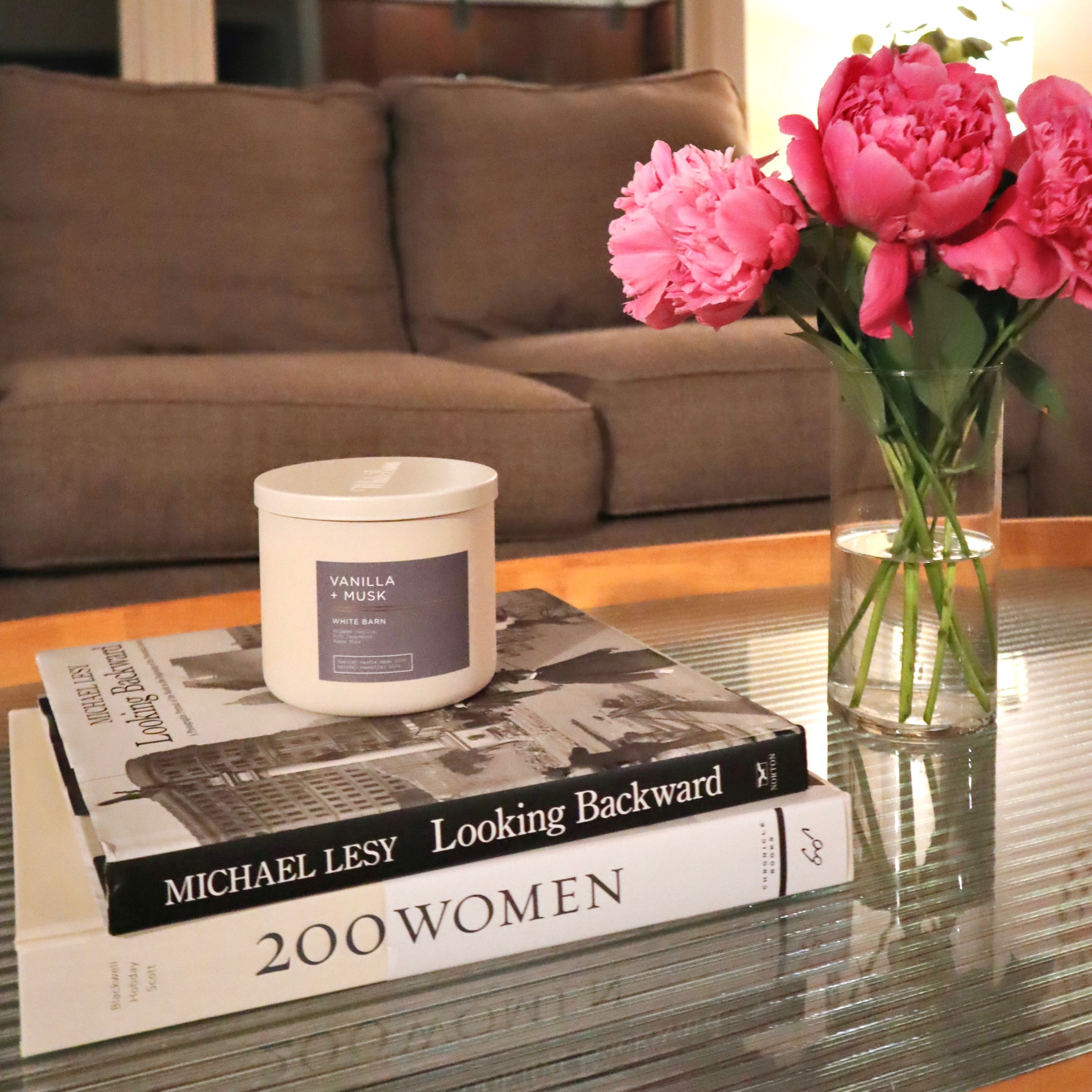 Cute coffee table set up! I LOVE peonies - these ones are real but you can get fake ones that are adorable too! 

#LTKhome #LTKfindsunder50