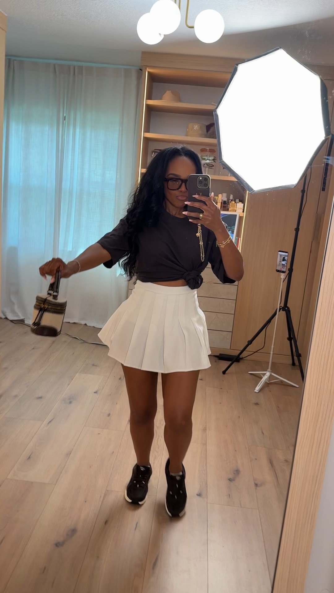 Scroll to shop this sporty-chic outfit featuring a crisp white pleated mini skirt styled with a relaxed knotted tee for an effortless off-duty look. The clean neutral palette keeps the outfit polished while the playful silhouette adds a fun, athletic-inspired vibe.

Perfect for casual days out, errands, coffee runs, travel days, or everyday summer style.

5'4" | 138 lbs | 34D bust | 27" waist | 40" hips

#LTKootd #LTKSpringSale #LTKvlog