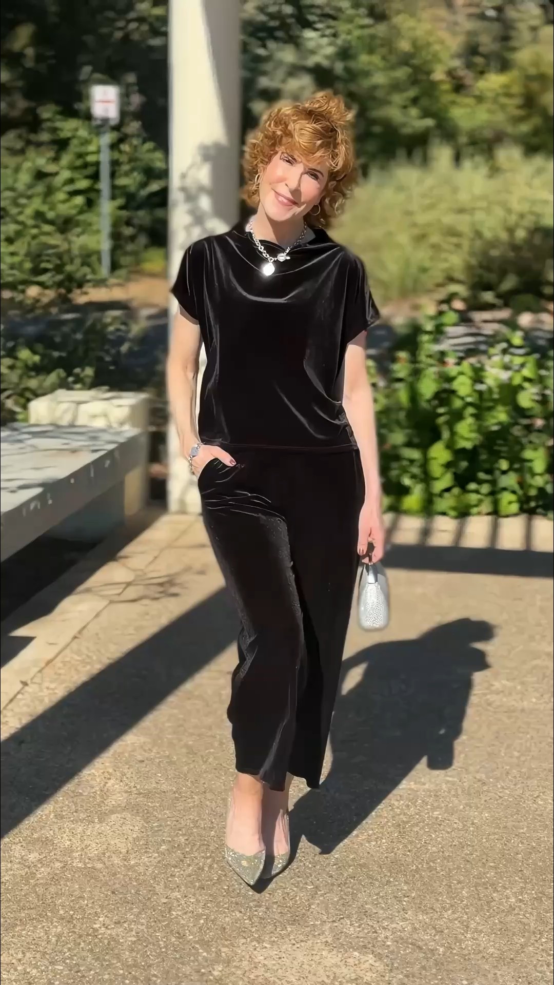 This luxe velvet set is one of those outfits that feels as good as it looks—soft, swishy, and so easy to slip on for anything festive. The wide-leg pants and relaxed top make a polished pair, and the sparkly heels and glittery mini bag give it just the right touch of glam. It’s an elegant, comfortable go-to for holiday dinners, concerts, or any night you want to feel a little extra.

#LTKOver40 #LTKSeasonal #LTKHoliday