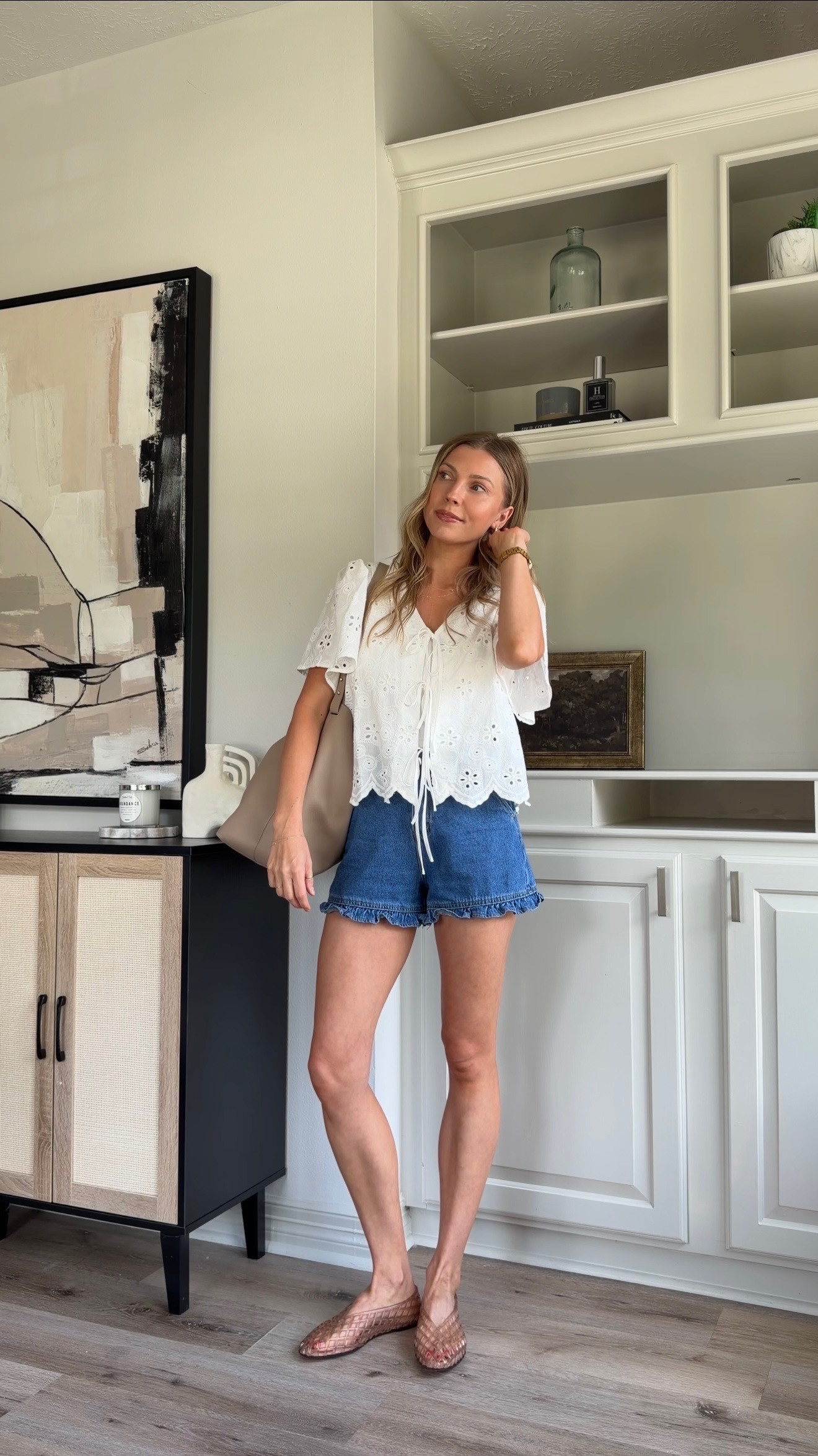 Comfy, put together nursing friendly outfit! Wearing small in tie top, nursing friendly sports bra and 2 in ruffle denim shorts 

 #LTKootd #LTKmomlife