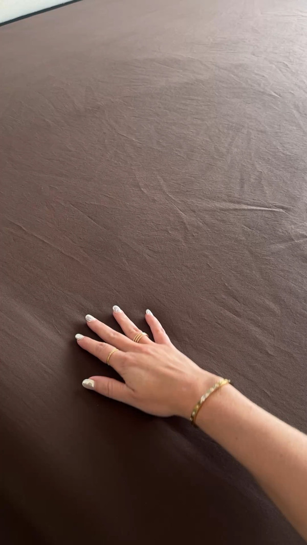 Falling in love with all the cozy layers this season Our brown bedding from Quince…