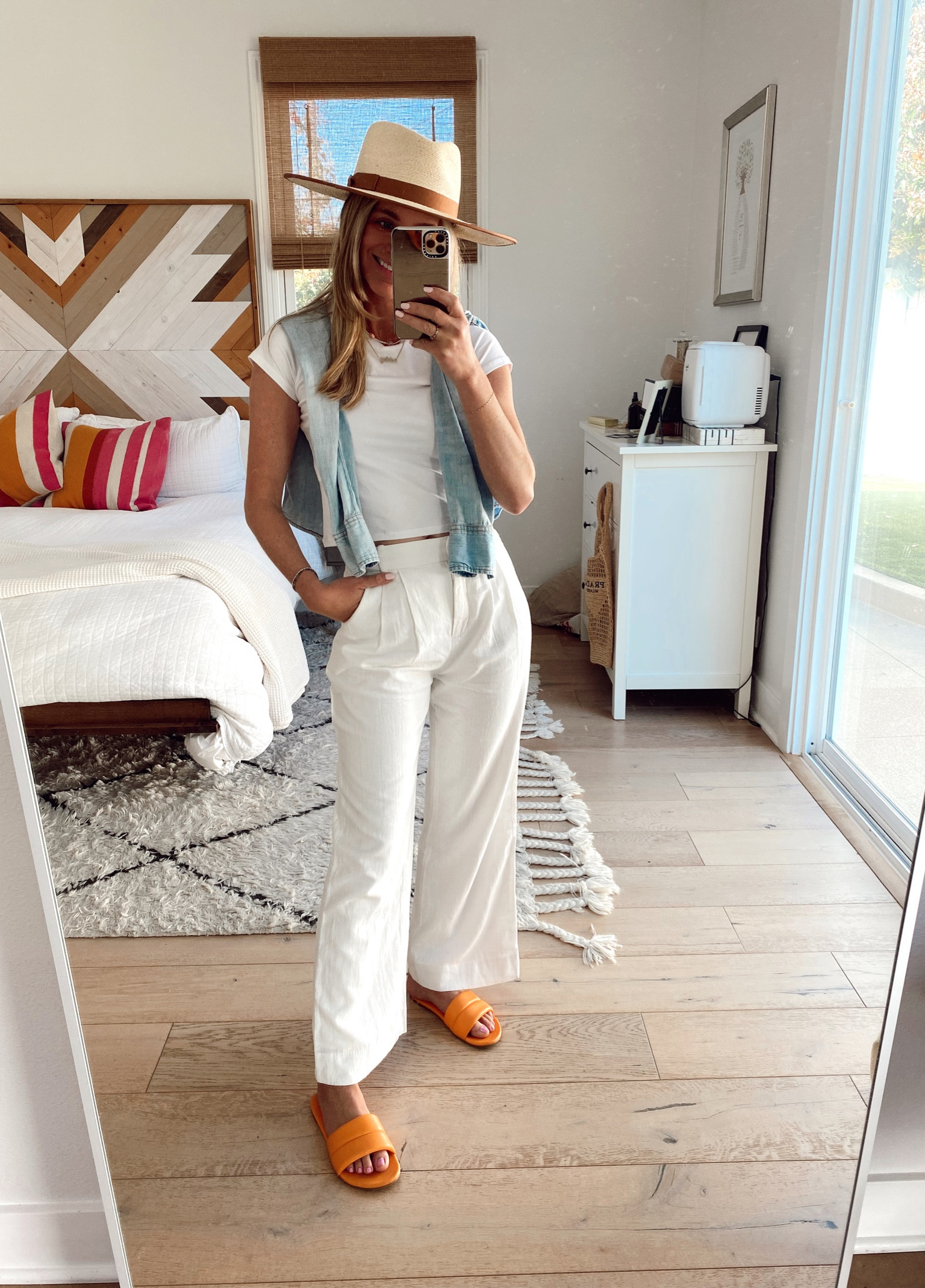 Abercrombie white linen trousers with Beek sandals and a brixton rancher hat  

#LTKunder100 #LTKSeasonal #LTKsalealert