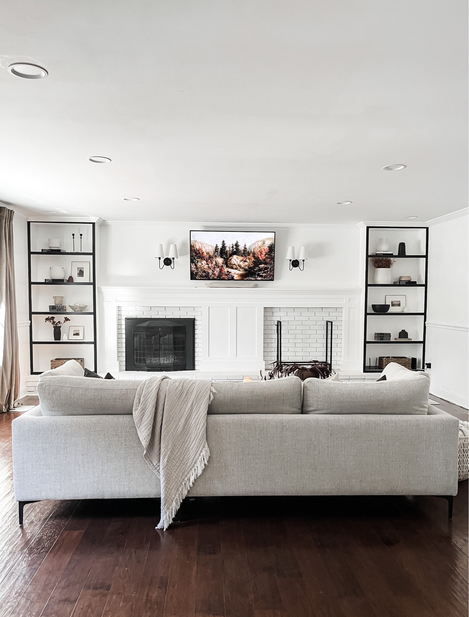 Fall living room, bookshelf decor, Amazon sconce, log holder, Target decor, fall decor
Sofa is from castlery. Similar linked.

#LTKSeasonal #LTKhome