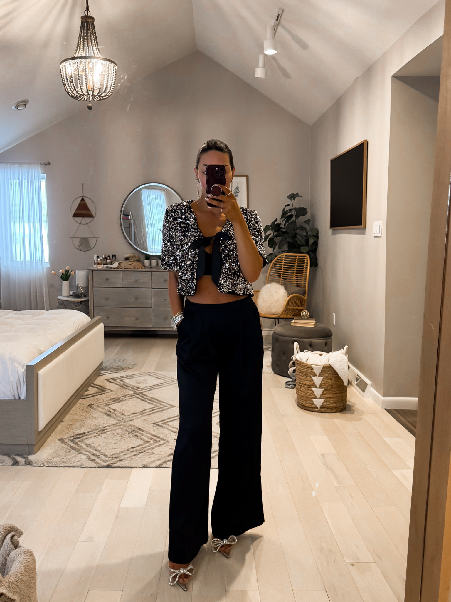 Trying on holiday looks and omg this sequin top and satin pants!!! So good. Def need to wear this on New Years Eve 🍾✨🪩 

Top is sold out in most sizes. Sign up for restock!! 

Sequin top- wearing Grey size S
Black wide leg satin pants-wearing size 2
Skims bralette underneath- M
Embellished bow heel- size up 1/2 size 

#LTKHoliday #LTKShoeCrush #LTKGiftGuide