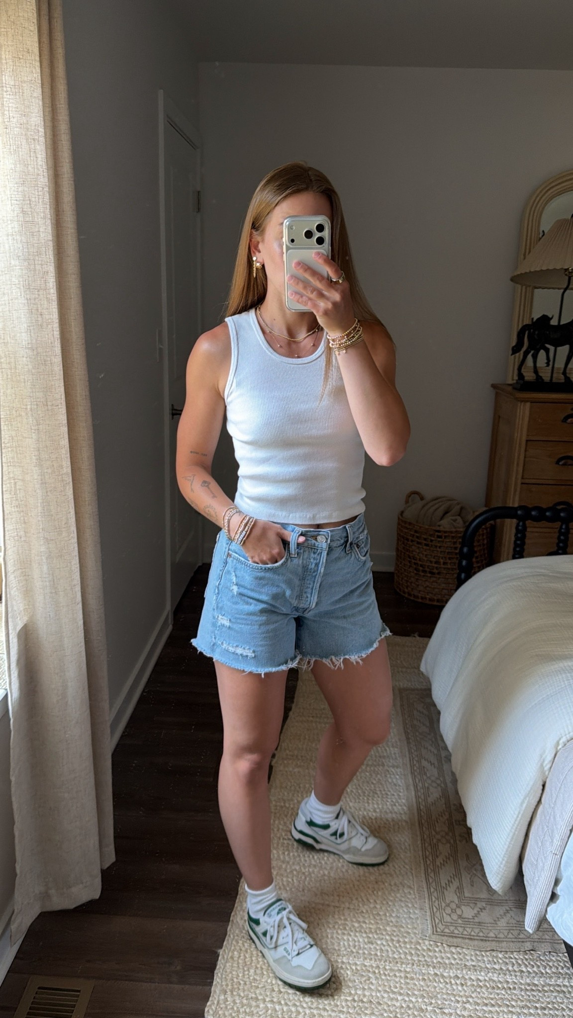 7/1/26 Casual Summer Outfit of the Day

One of my go-to casual summer outfits 🤍 wearing my Agolde denim shorts with a Brandy Melville tank and New Balance 550 sneakers. An easy, everyday outfit that’s perfect for coffee runs, errands, walks around town, or any casual summer day. Everything I can link is linked here ✨

#LTKootd #LTKSeasonal
