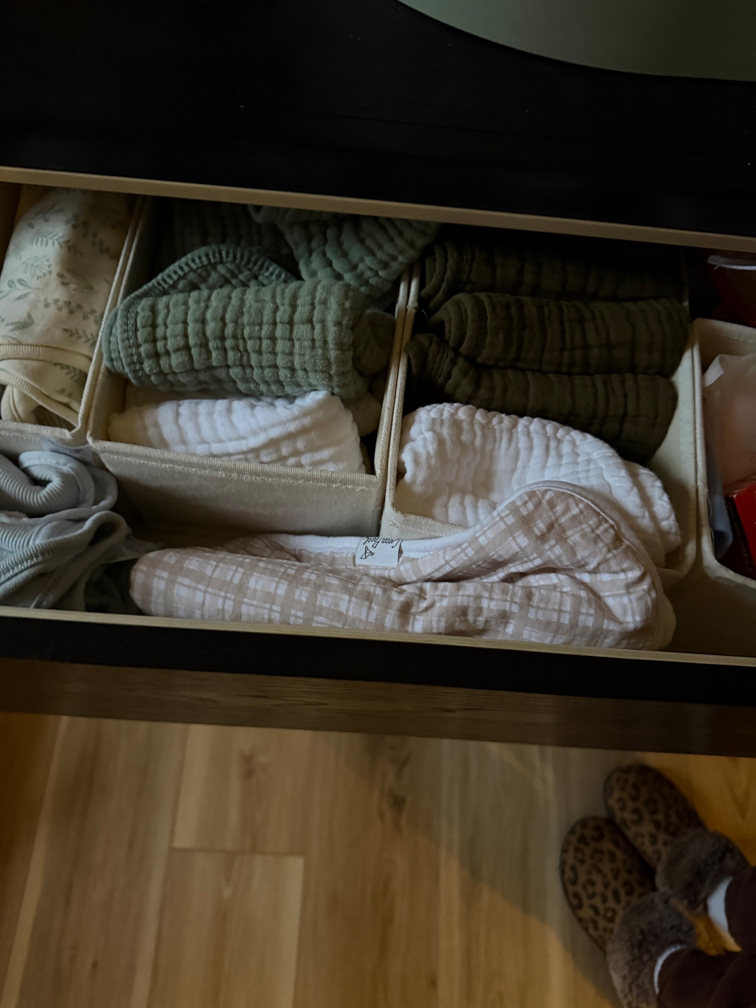 The best nursery drawer organizers! They are linen come in a multitude of sizes and fit well! Mine are a little bit messy right now, but they help keep everything in the dresser so nicely! This is our burp cloth/bib/feeding drawer. I use the larger organizers for these muslin burp cloths, and the smaller one for breast-feeding supplies like nipple pads and nipple butter.

#LTKmomlife #LTKHome #LTKdayinmylife