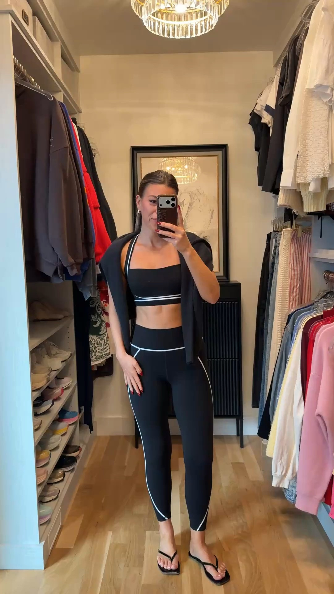 black sports bra and high-waisted leggings with white contrast piping, styled with a black sweater Vuori cozy loungewear and fitness set perfect closet staple for fall 🙌🏻🍁

I’m 5’4” and typically wear a small / 2
• medium black sweater
•xs sports bra 

Loungewear, Sweatpants set, Hoodie, Sports bra, Athletic vest, Leggings, Jackets, Everyday causal, workout set, leisure