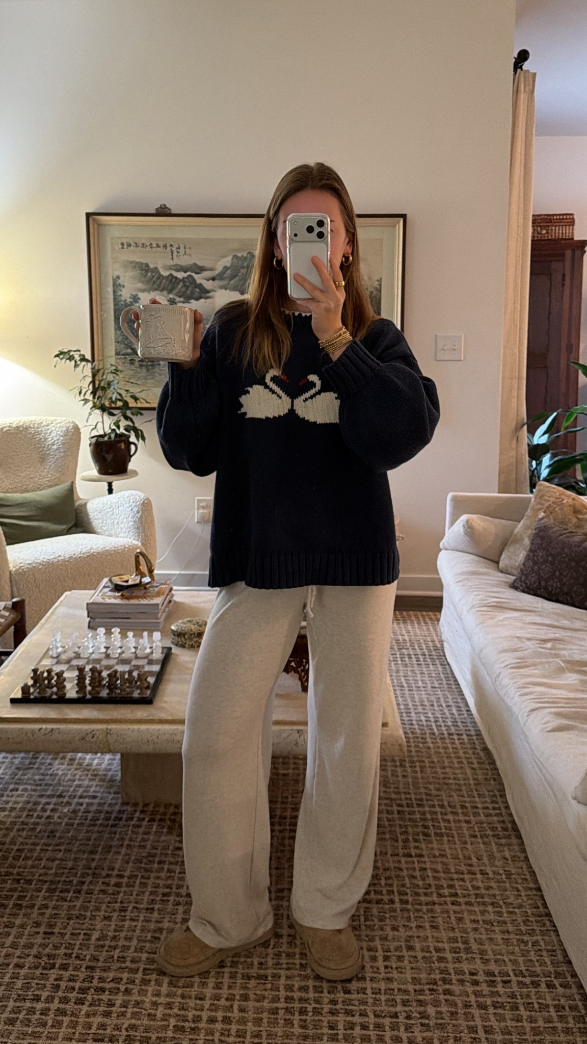 1/6/26 Cozy morning loungewear I keep reaching for 🤍 wearing my Aritzia lounge pants with my navy swan sweater for an easy, relaxed start to the day. The sweater is a size M/L for an oversized, comfy fit. Everything is linked here.

#LTKmorningroutine #LTKootd