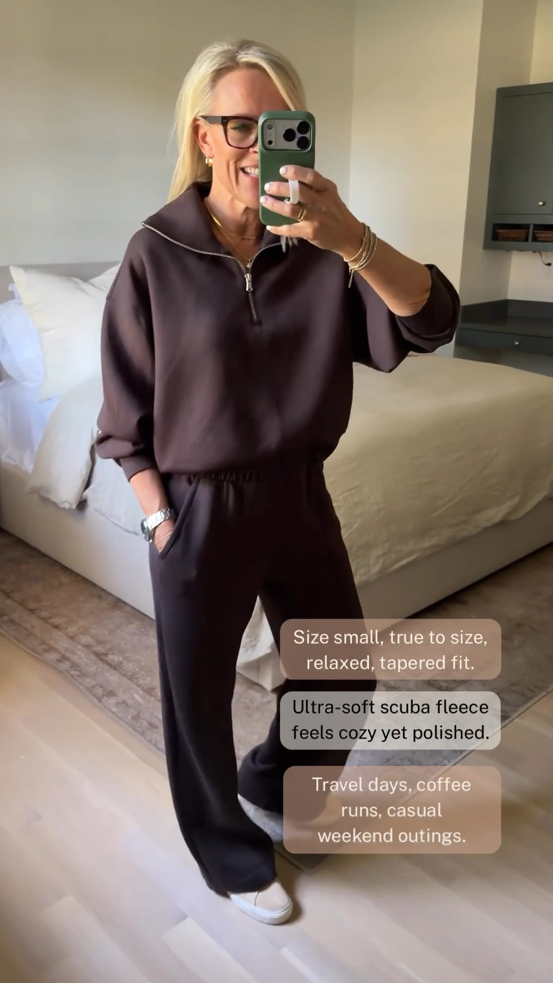 This dark brown scuba fleece matching set is such a good option for travel days and everyday errands. The quarter-zip pullover and relaxed, tapered pants feel cozy while still looking polished, making this an easy outfit to wear from coffee runs to casual weekend outings.
I’m wearing a small, true to size. I love a matching set like this because you get a comfortable, coordinated look with very little effort.