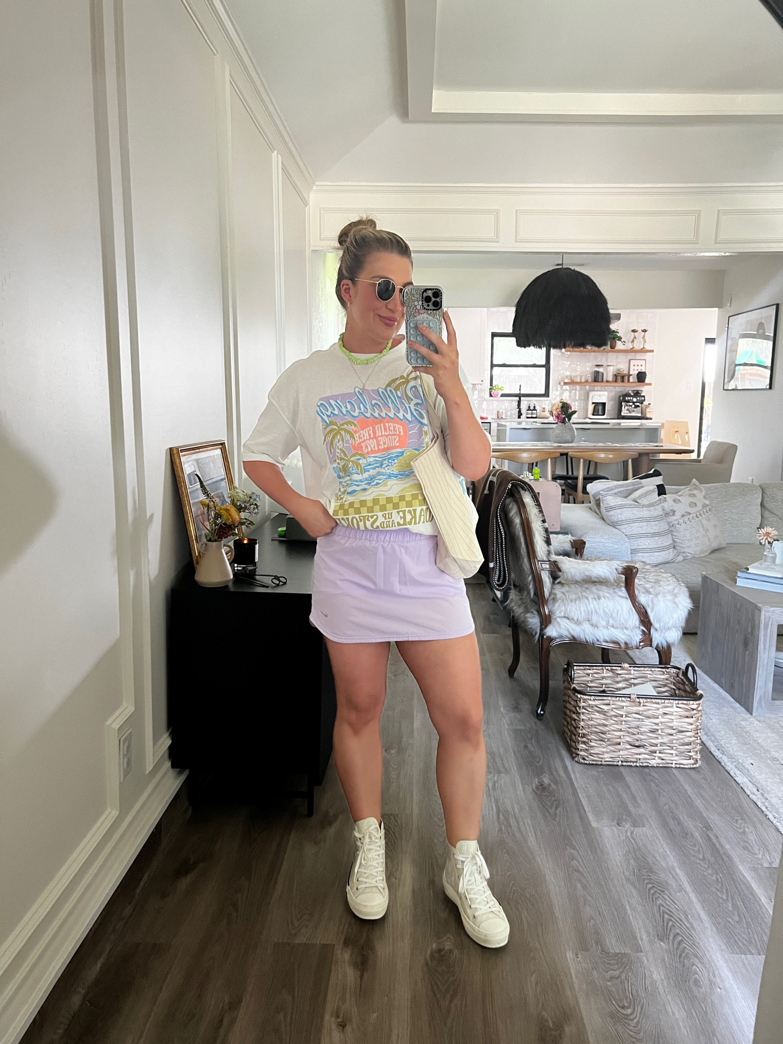 Fun summer outfit as a mama! Love this skort paired with an oversized tee. Wearing mediums! Puka shell necklace on sale 

#LTKSummerSales #LTKxNSale #LTKFitness