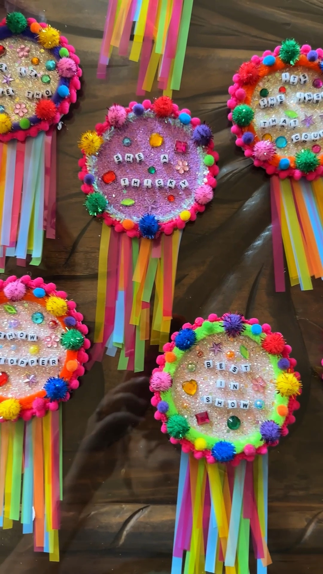 I love me a good DIY and this was no exception! I had a Cake Picnic themed Birthday Party where all of my guests had to bring a cake and I made these awards to give out. The trick on these is the more color, texture and funky the better. Think, pipe cleaners, gems, Pom poms, rhinestones, glitter, all the things. 



#LTKKids #LTKFindsUnder50 #LTKFamily