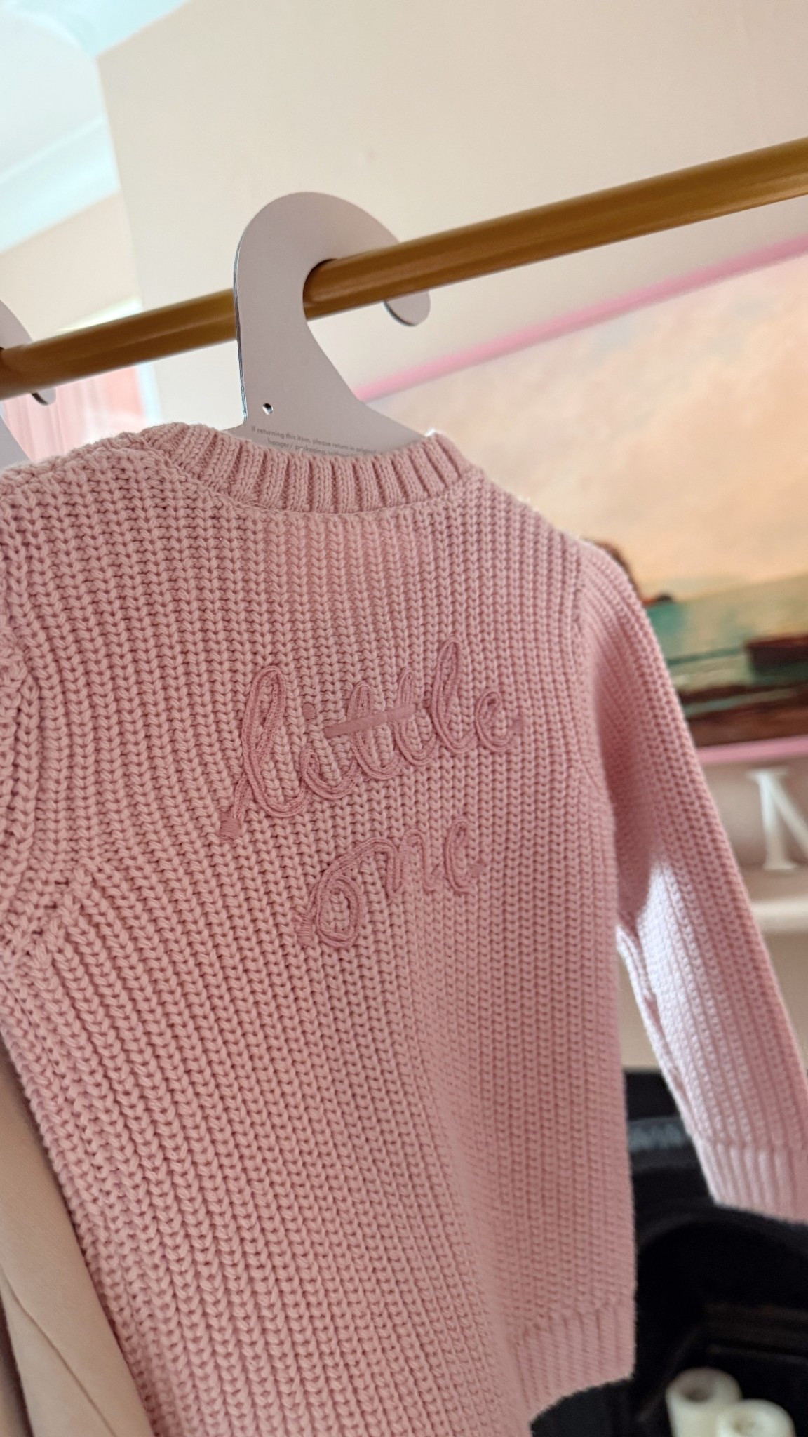 Pink cardigan with ‘little one’ embroidered on the back. Comes in cream and beige as well! 