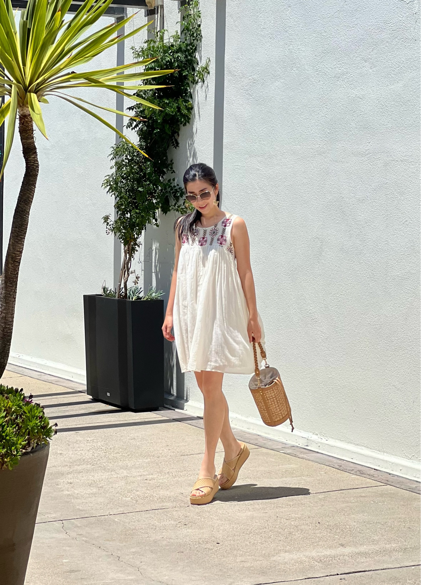 A breezy day calls for a lightweight linen dress! This cute one has bead detailing on the front and back panels. It also has somewhat of an open back to allow for more air flow! I paired it with my bucket bag and beige crisscross wedge sandals.

#LTKSeasonal #LTKShoeCrush #LTKStyleTip