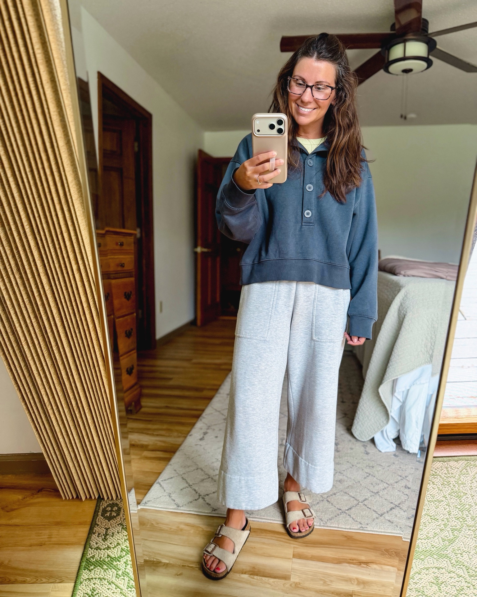 Taking care of my kiddo who got a tonsillectomy and adenoidectomy yesterday🤍

75% cotton. Wearing size small. Xs in my tank and small in my sweatpants. My Birkenstock sandals are size 36. 

The sweatshirt is also on sale for $17.50 today!