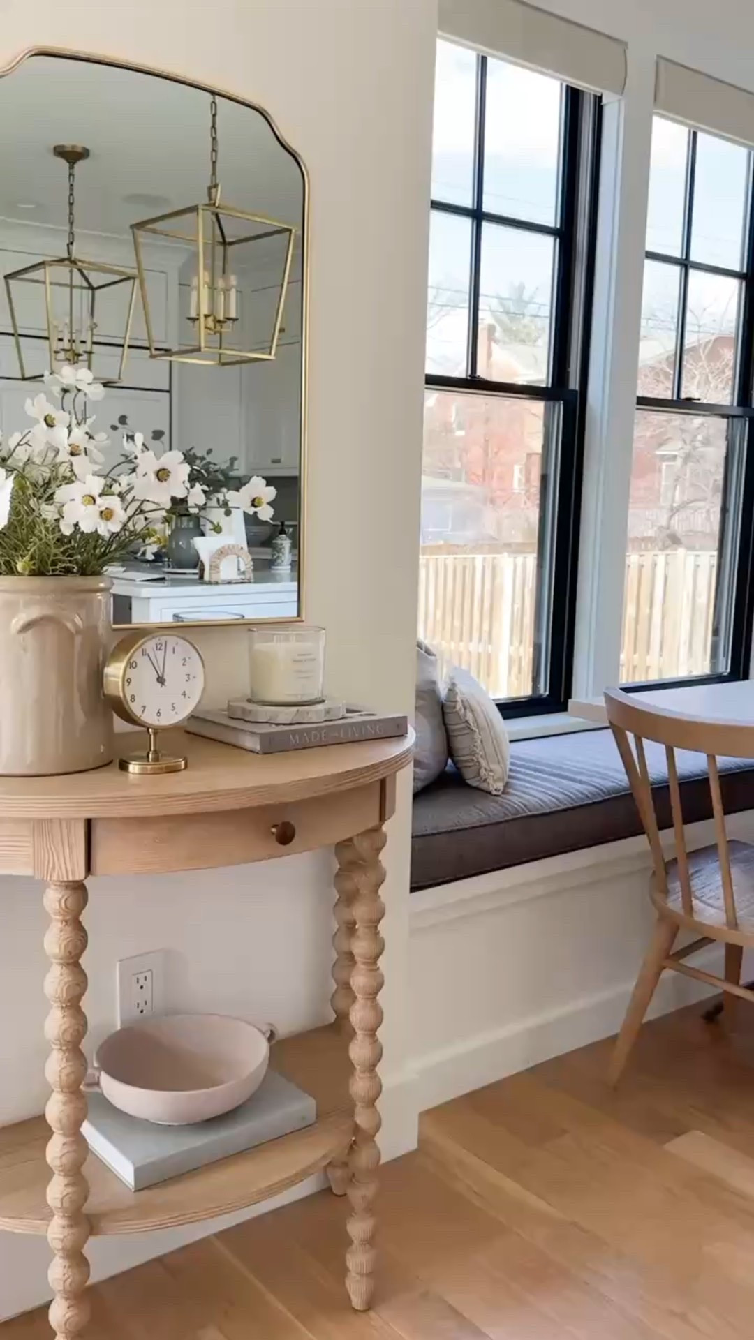 Breakfast nook with linear chandelier. Demilune light wood console table from Serena and Lillie. Look for less signs. Modern coastal, traditional home, home before, home decor styling.

#LTKHome #LTKStyleTip #LTKWatchNow