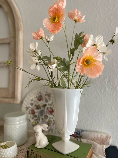 For a simple Spring display, try popping a few artificial flower stems into a favorite vase. Then, add coordinating decor based on the color of the flowers!

#LTKfindsunder50 #LTKhome #LTKSeasonal