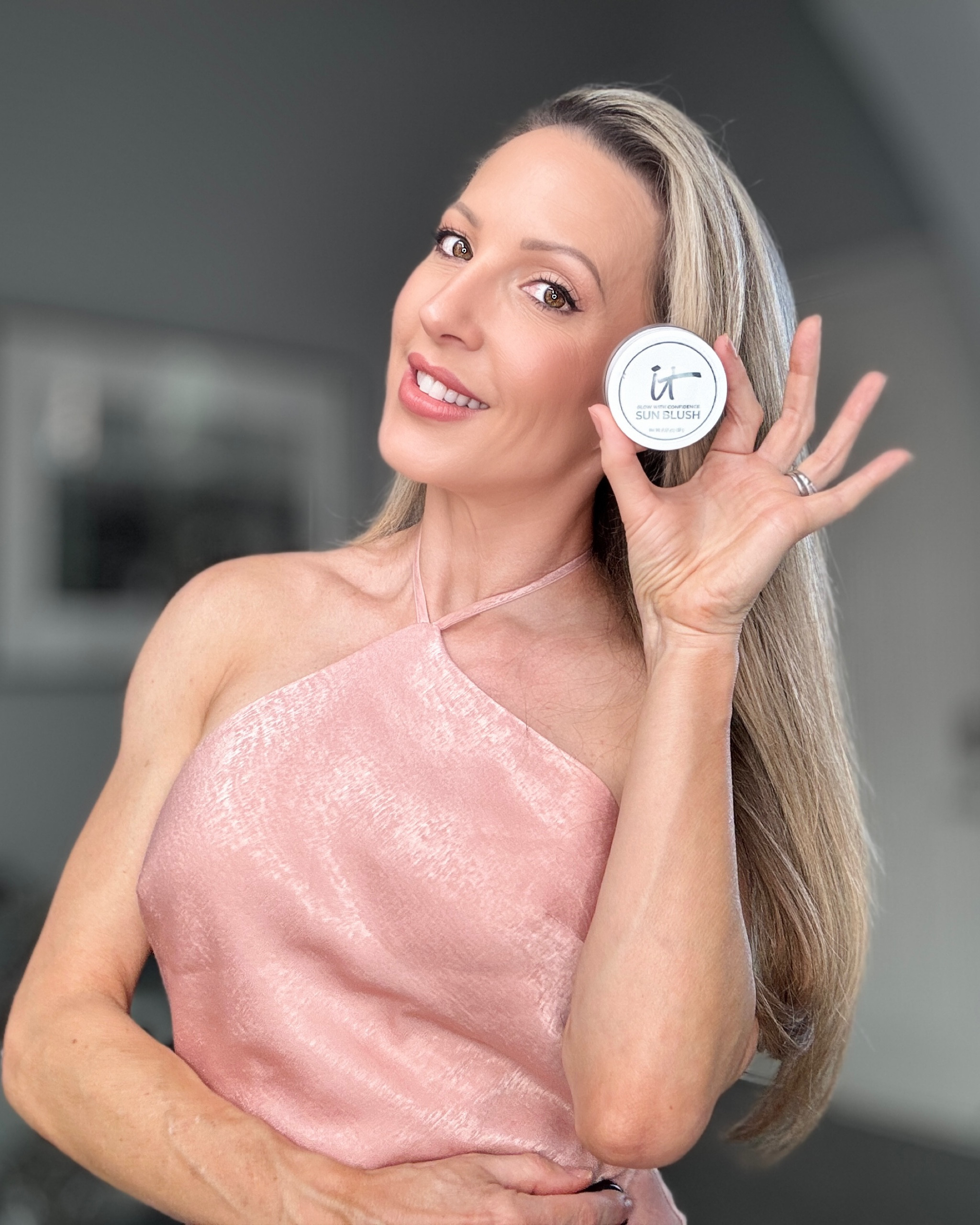 It Cosmetics skin-caring cream blush + bronzer in one for a naturally sun-kissed look.

Apply with brush or fingers.

There are different shades for different skin tones.

They Recommend sun warmth for medium to tan and sun blossom for light to medium.

#makeup #antiagingmakeup

Benefits
92% skincare base: hyaluronic acid, vitamin E & peptides for a hydrating, smoothing formula.
5 effortlessly buildable shades.
Creamy balm texture melts into skin.
Can be used on bare skin or over foundation.
Suitable for Sensitive Skin, Non-Comedogenic

#LTKBeauty #LTKOver40 #LTKFindsUnder50