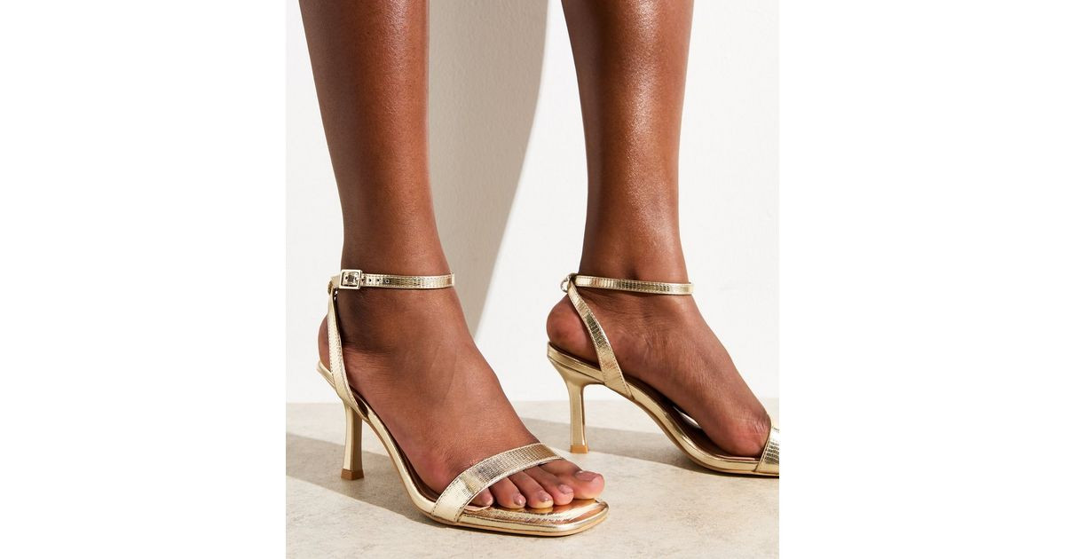 Gold Metallic Faux Leather Stiletto Heel Sandals
						
						Add to Saved Items
						Remove fro... | New Look (UK)