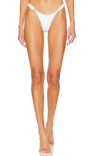 Amelia Ruffle Bikini Bottom in White | Revolve Clothing (Global)
