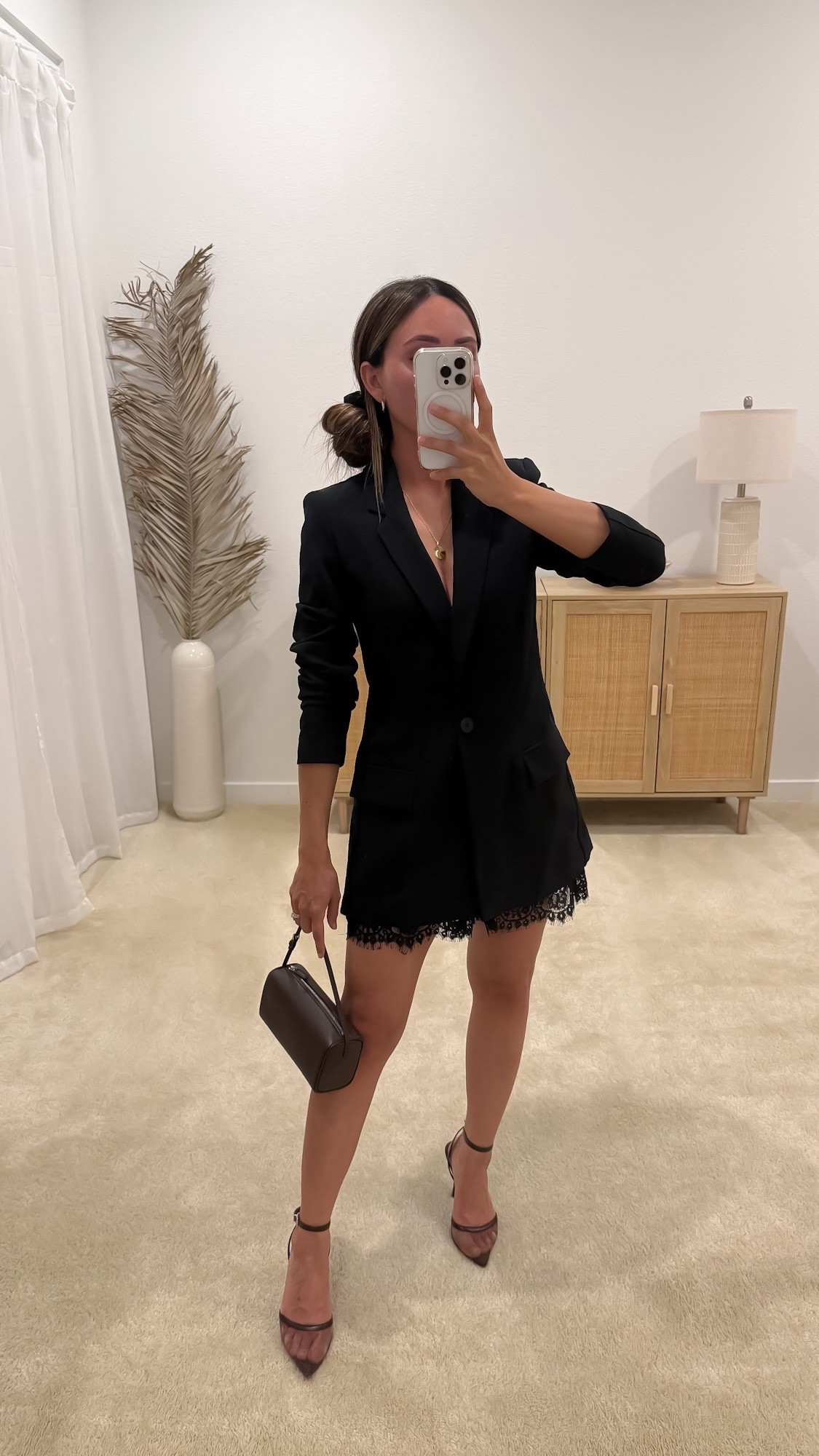 Date night outfit idea: I styled this long blazer jacket as a blazer dress (I’m 5ft) by adding a button pin and pairing it with lace trim shorts, mesh heels, and a cute mini barrel bag. It looks so chic with the sleeves rolled up or down! | petite outfit, Amazon outfit, Amazon fashion, black blazer outfit, blazer dress outfit, lace shorts outfit, night out outfit, party outfit, outfit hack, neutral capsule wardrobe outfit // neutrallynicole, @neutrallynicole, neutrallynicole.com, Neutrally Nicole

#LTKootd #LTKPetite #LTKSaleAlert