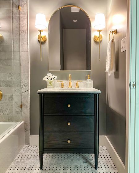 My black bathroom vanity is on clearance plus and extra 15% off with code EXTRA! Quality is stunning and I love the marble top!

moody bathroom, arch gold vanity mirror, Amazon, Pottery Barn, sconces 

#LTKfindsunder100 #LTKhome #LTKsalealert