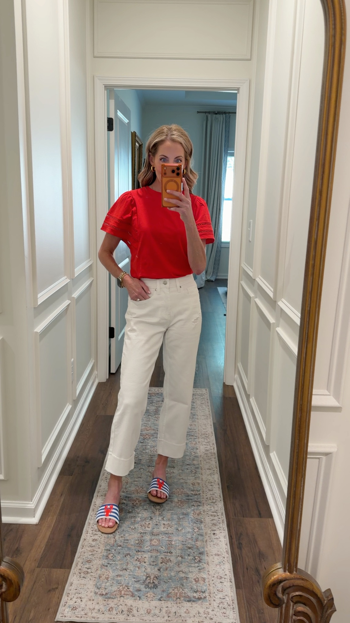 My favorite red shirt has been restocked. I love this flutter sleeve top. It is so good. I bought it in three other colors less than $15. Paired with these jeans less than 30. 