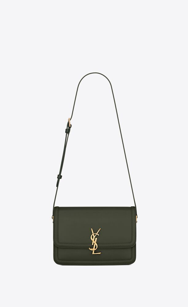 satchel bag with front flap and pivoting metal YSL closure, featuring an adjustable shoulder stra... | Saint Laurent Inc. (Global)