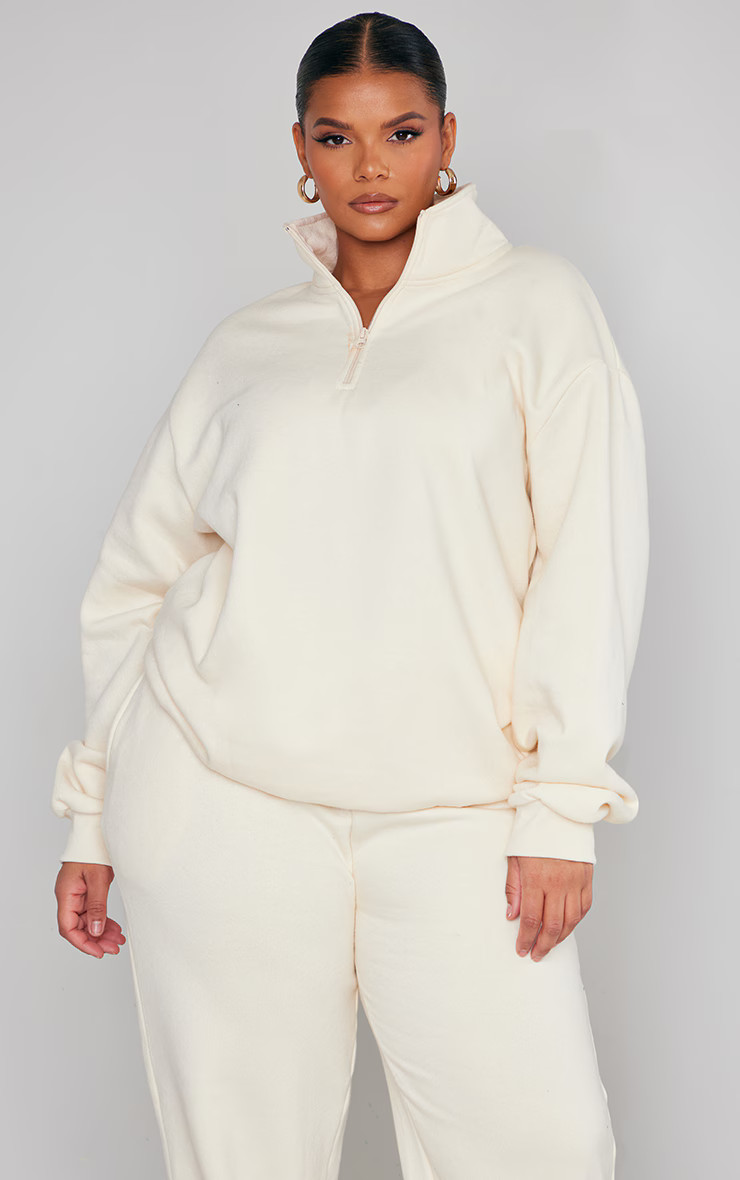 Plus Cream Half Zip Sweatshirt | PrettyLittleThing US